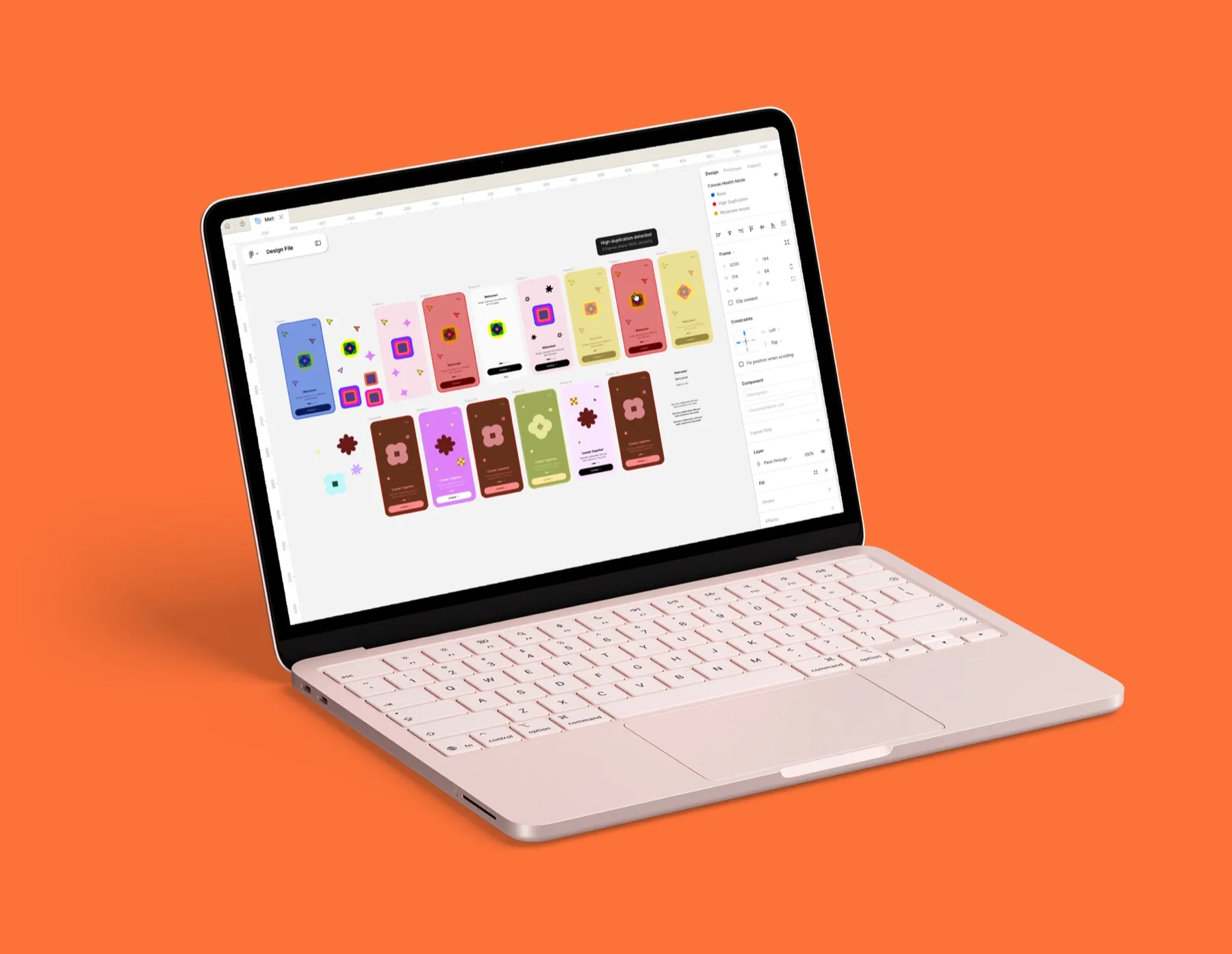 Figma design work displayed on a laptop against orange