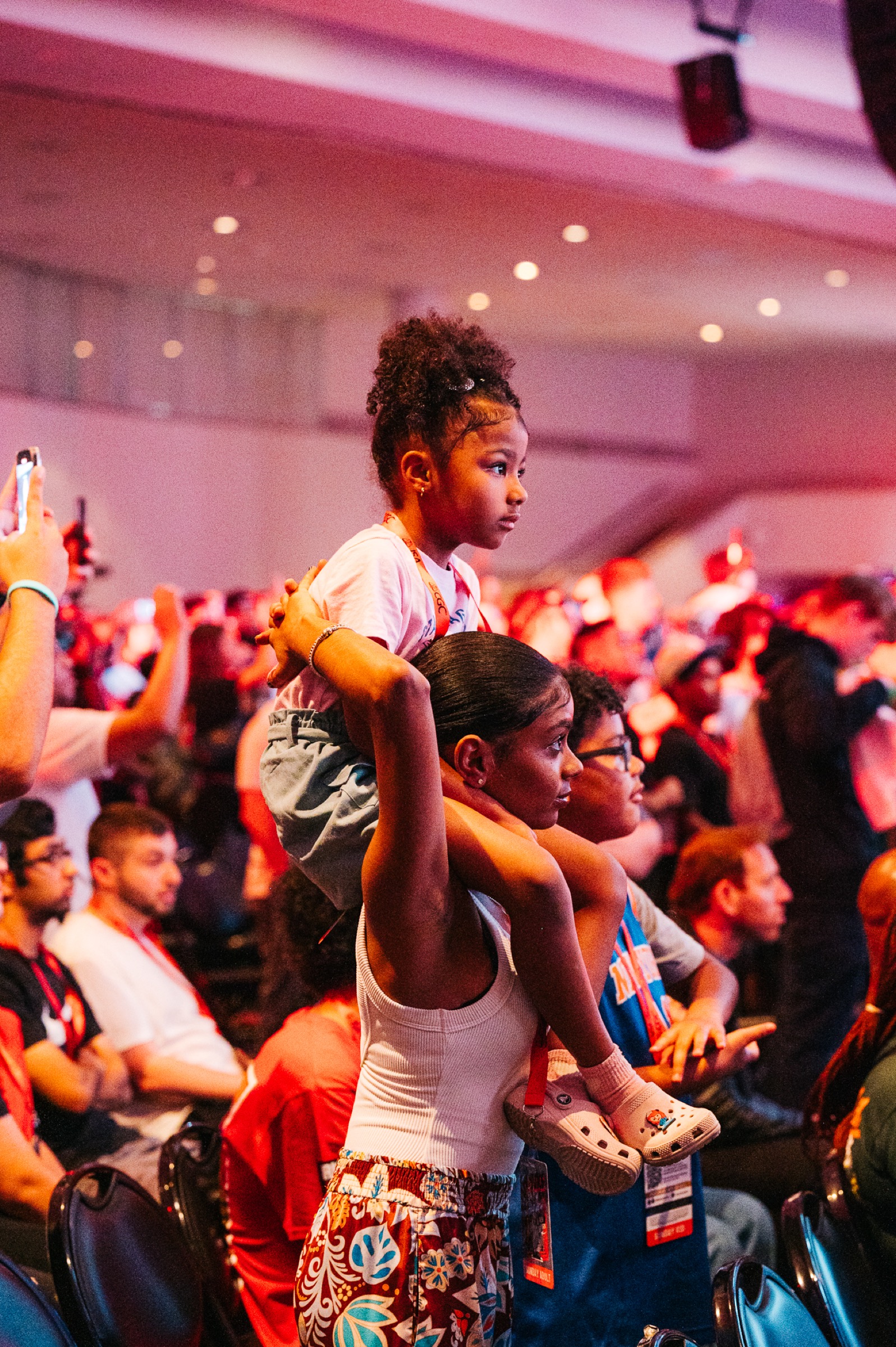 Child on shoulders at Fanatics Fest